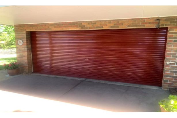 Newly painted closed garage door.